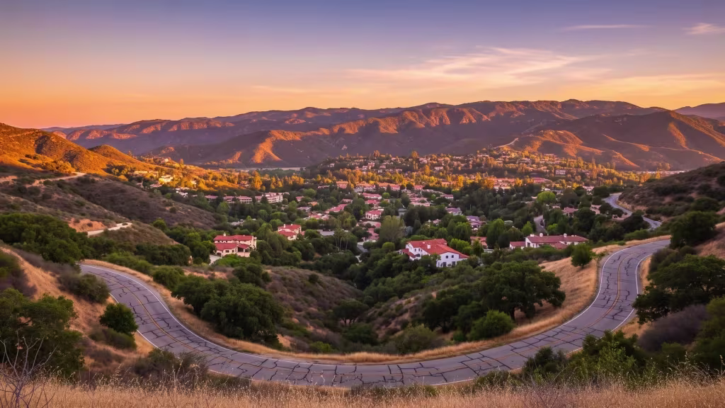 A winding road threads Bell Canyon's hilly residential landscape in this elevated oblique view