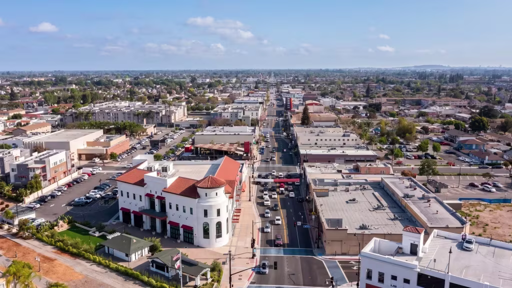 Bellflower's downtown commercial avenue and surrounding blocks fill this high aerial view