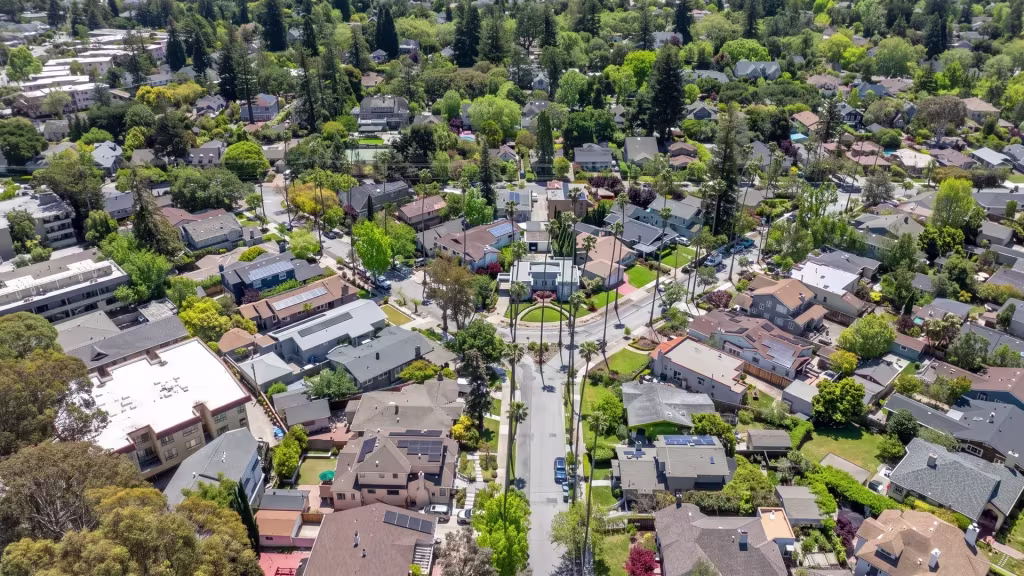 Leafy residential blocks line Burlingame's local streets in this aerial neighborhood view