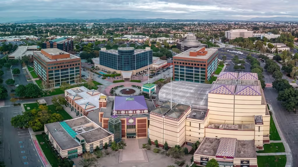 Cerritos' civic arts complex anchors the surrounding city blocks in this high aerial landmark view