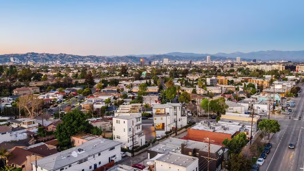 Culver City's mixed residential and urban blocks spread toward distant hills in this aerial view