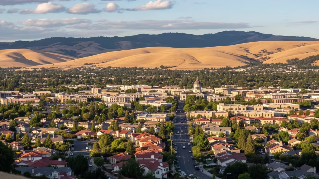 Golden hills back up against Fairfield's low-rise city neighborhoods in this elevated panorama