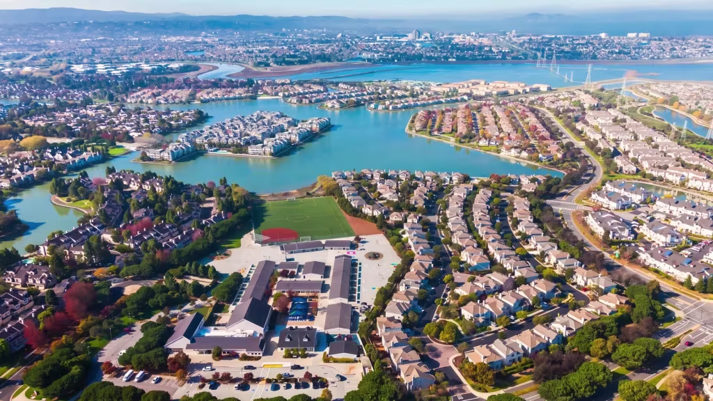 Waterways wind between the lagoon-side homes of Foster City in this aerial waterfront view