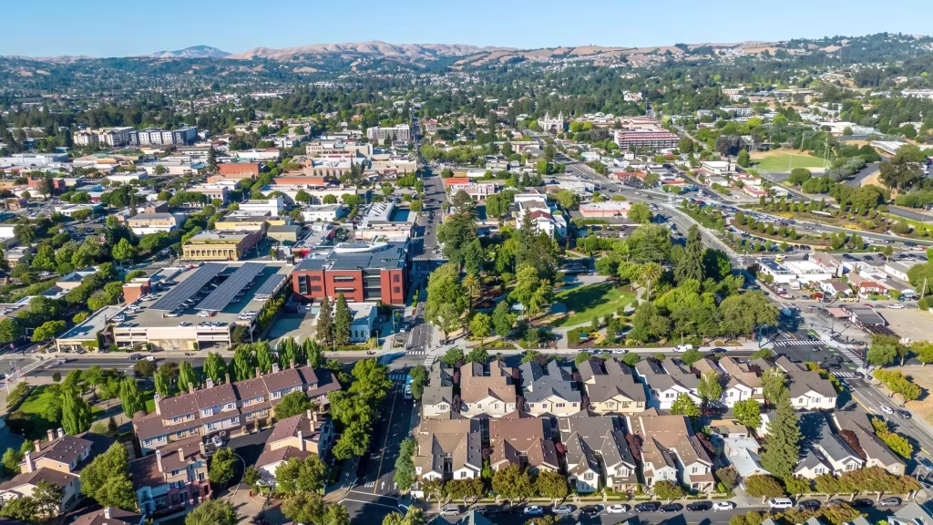 Commercial and residential blocks sit side by side across this stretch of Hayward