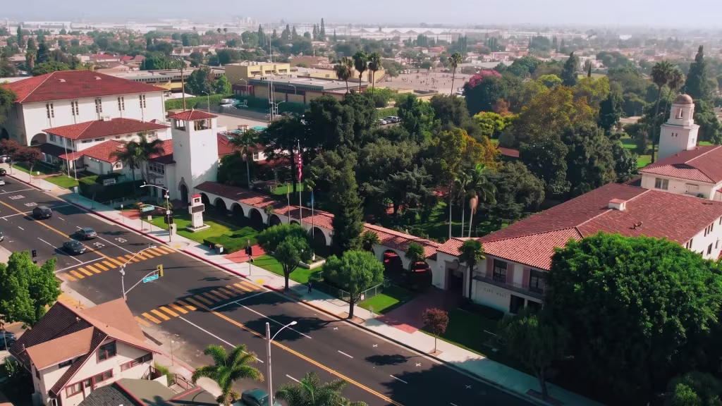 A civic landmark rises above the avenue running through Huntington Park in this elevated oblique view