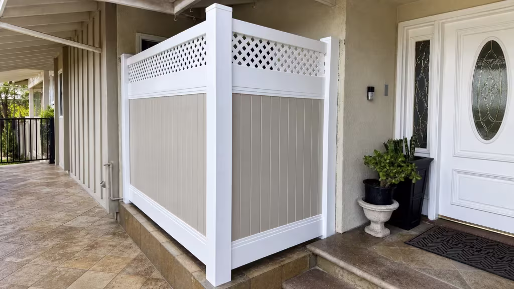 Tan and White two-tone vinyl privacy fence with a white lattice top anchored on a tiled patio entry in Glendale