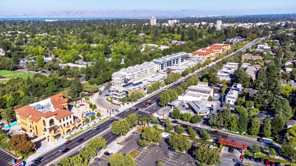 A mixed-use avenue runs through Menlo Park, bordered by surrounding neighborhoods on both sides