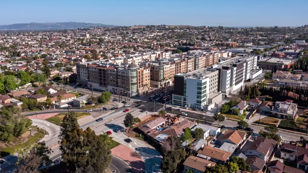 Monterey Park's mixed-use and residential blocks spread across rolling terrain in this aerial city view