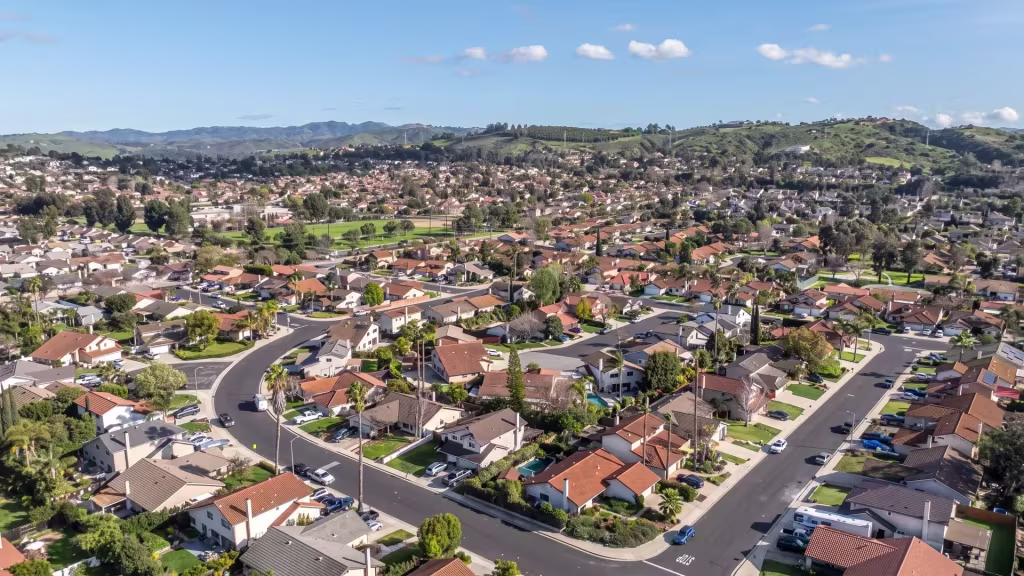 Aerial panorama over Moorpark, showing expansive suburban neighborhoods stretched toward the hills
