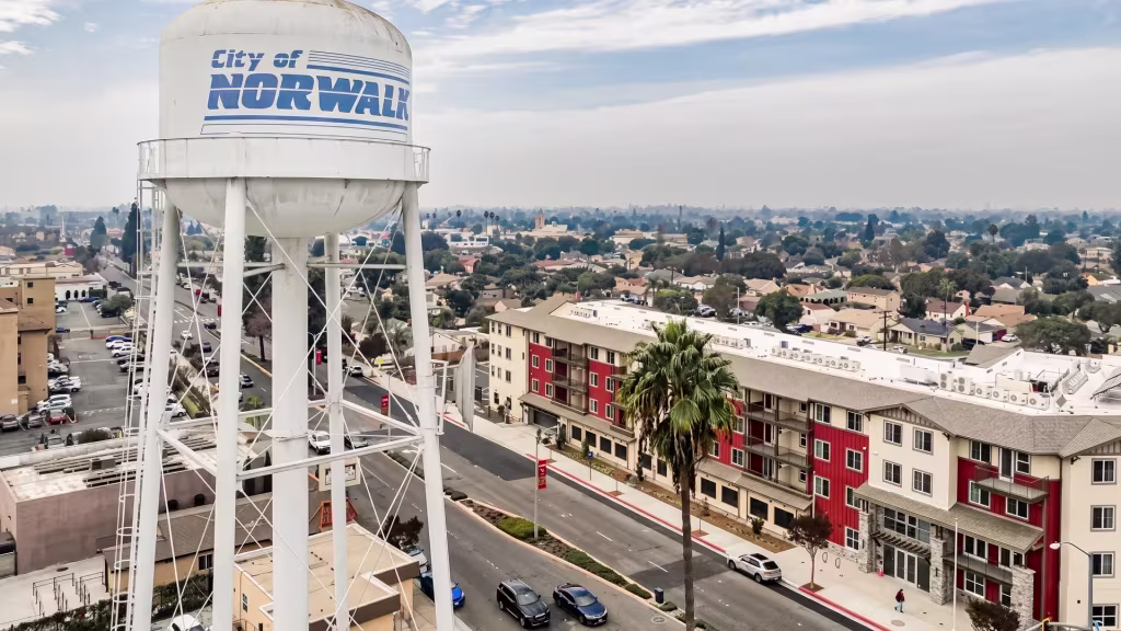 A water tower landmark rises above Norwalk's mixed residential development in this aerial view