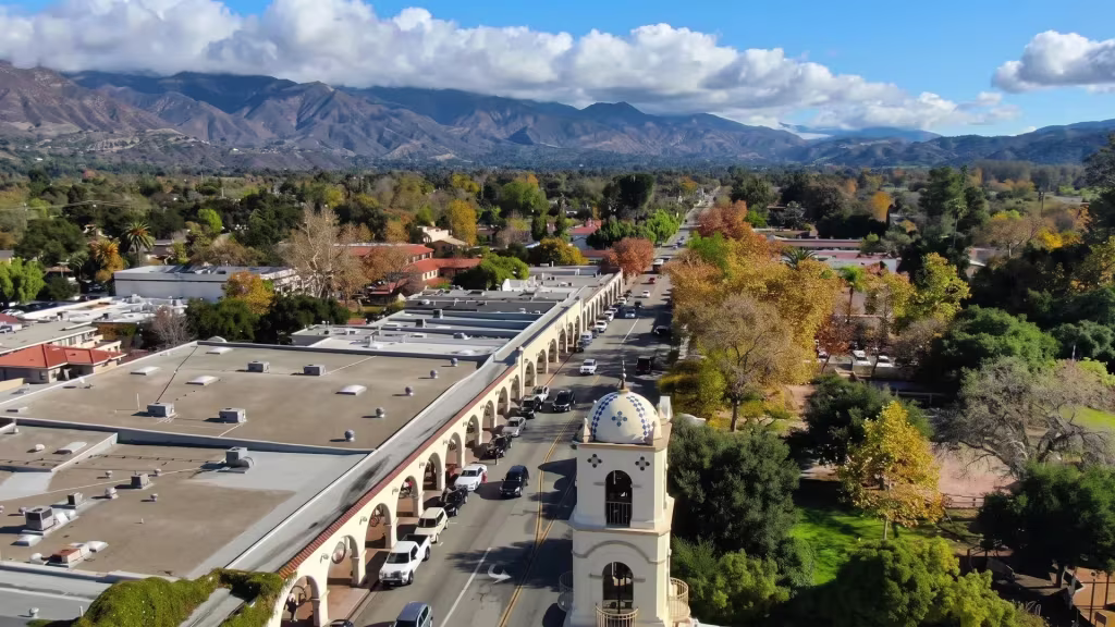 A historic civic landmark anchors Ojai's town center in this elevated view over the mountain valley