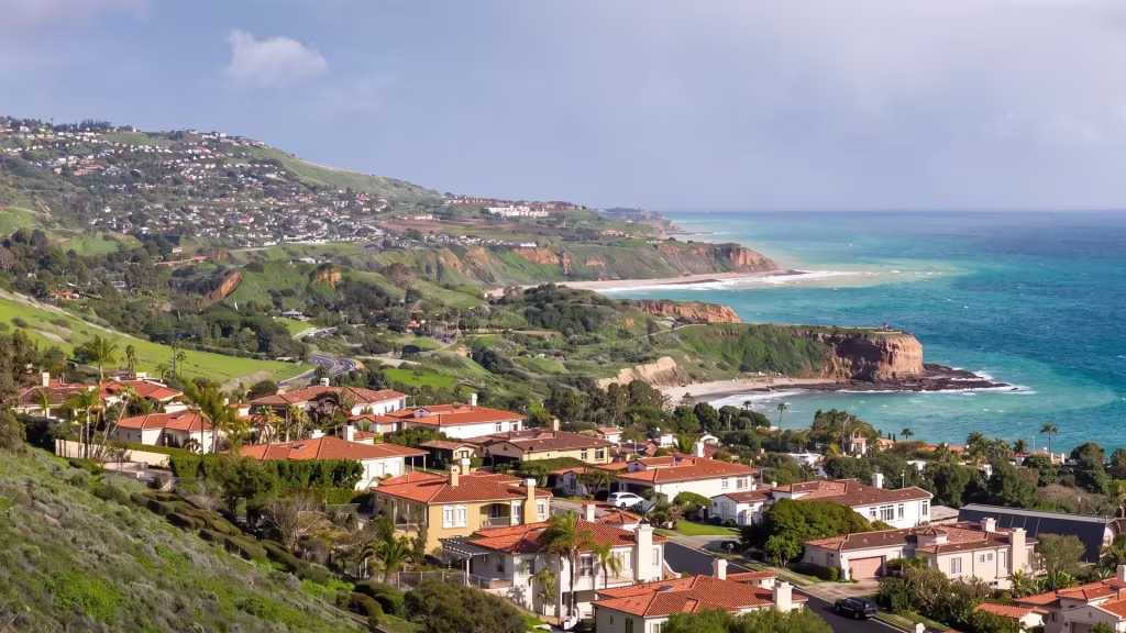 Coastal hillside homes in Rancho Palos Verdes overlook coves, cliffs, and open ocean
