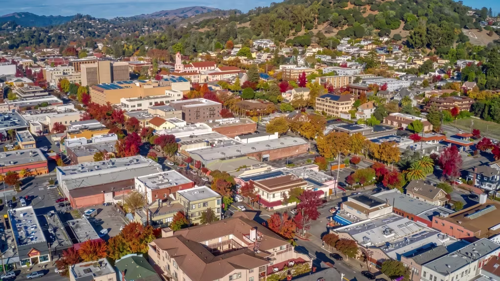 Hills ring the compact downtown of San Rafael, closing in tight around its town center