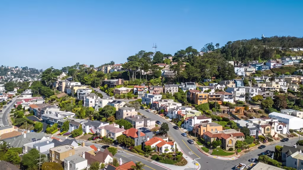 Winding streets thread through the tree-filled residential neighborhood of Sherwood Forest