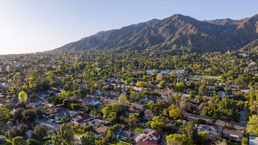 Elevated panoramic view over Sierra Madre, where foothill neighborhoods sit below a prominent mountain