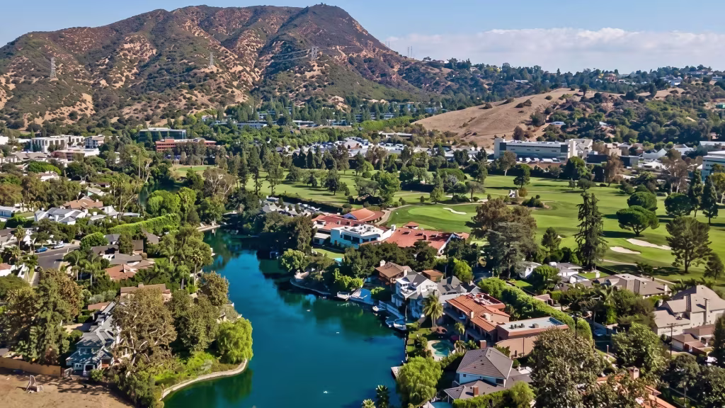 Waterfront panorama over Toluca Lake, a residential community gathered around a small lake