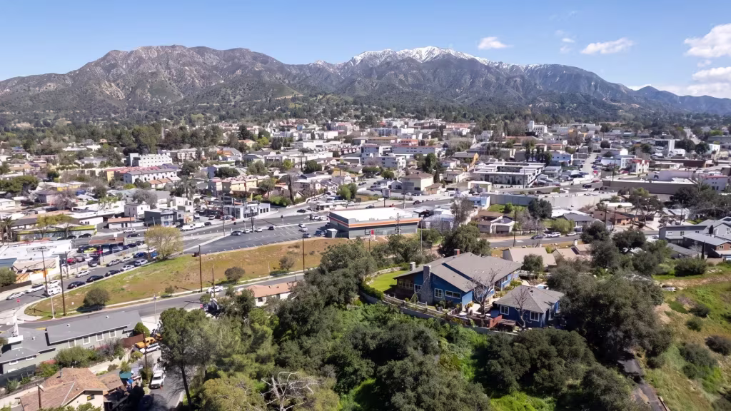 Elevated panorama over Tujunga, a foothill town center set directly beneath the mountains