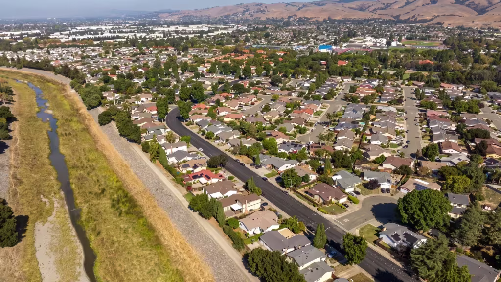 A residential grid follows a flood-control channel and hills in this panorama of Union City