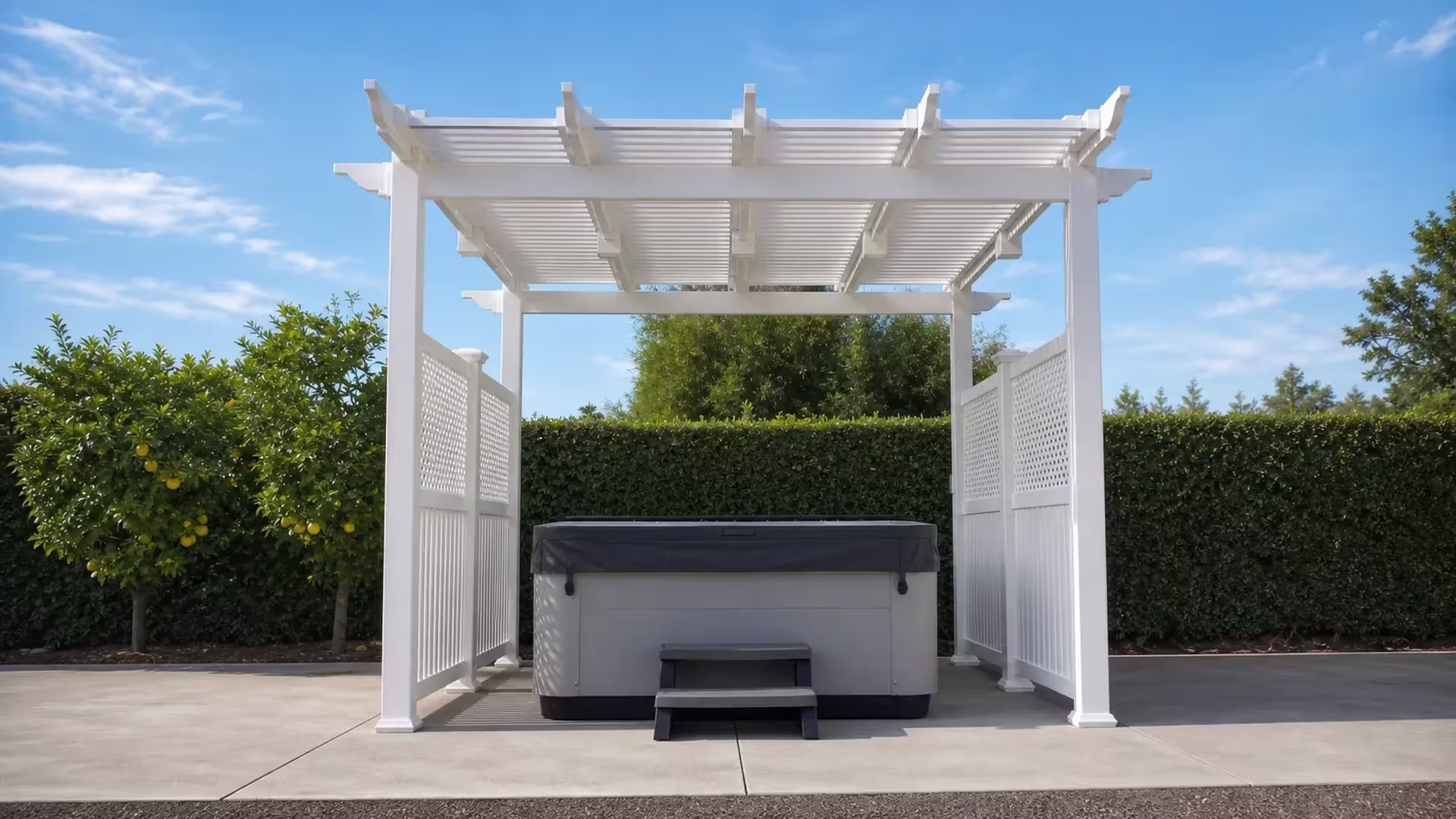 Solid roof White vinyl freestanding patio cover framed by sculpted rafter ends over a concrete patio