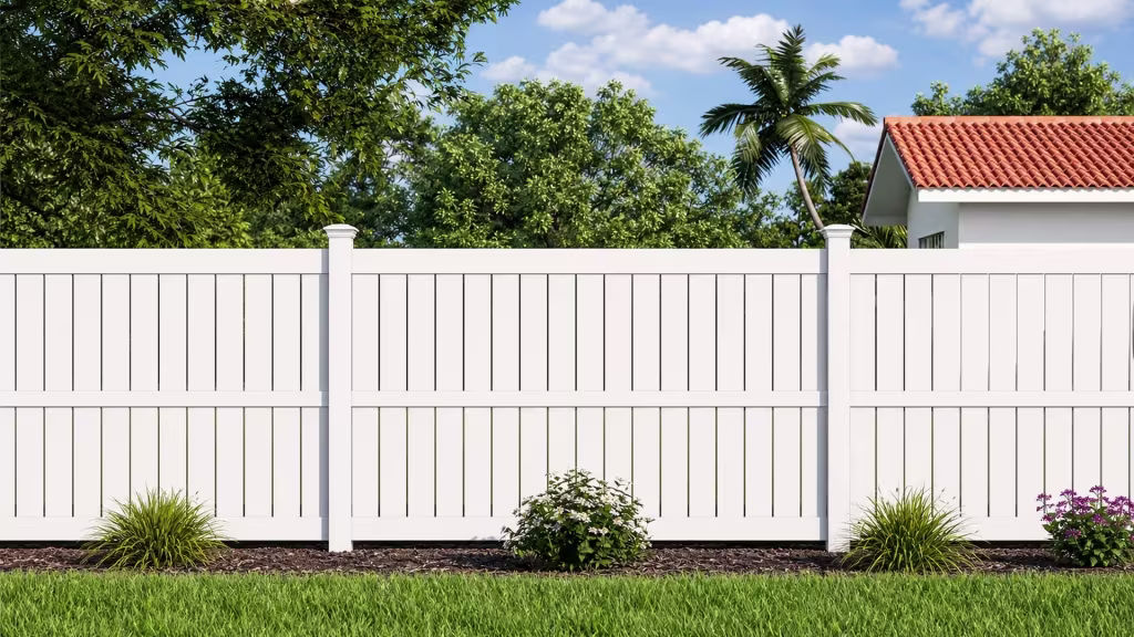 Red clay-tile roofline rises behind this White vinyl semi-privacy fence and its single center panel