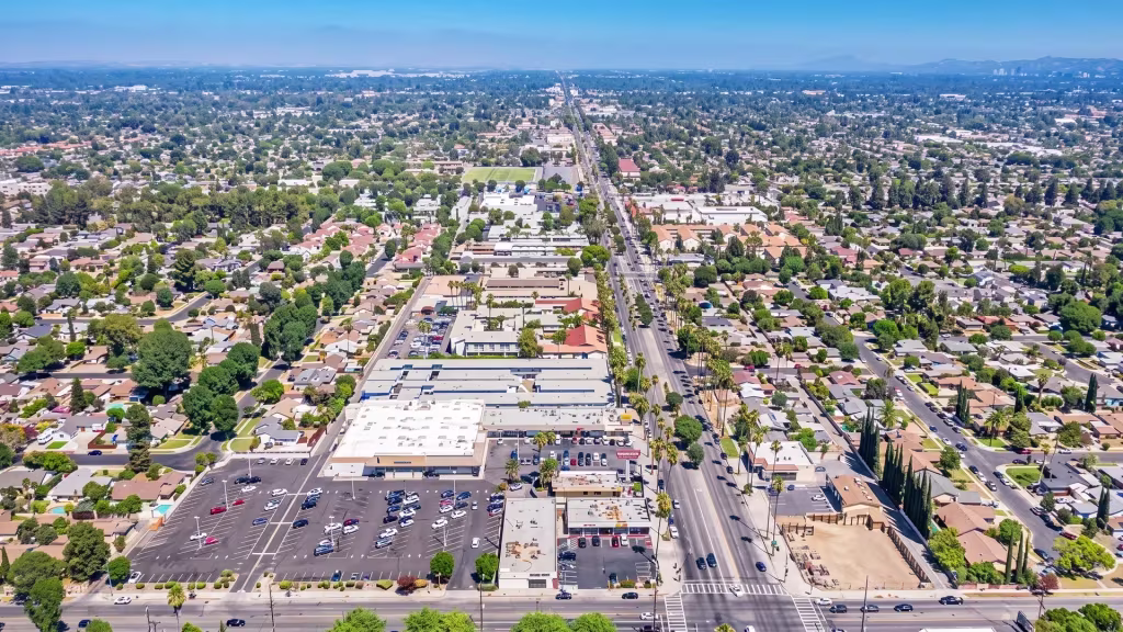 A broad suburban grid runs alongside a commercial corridor in Winnetka, captured from high above