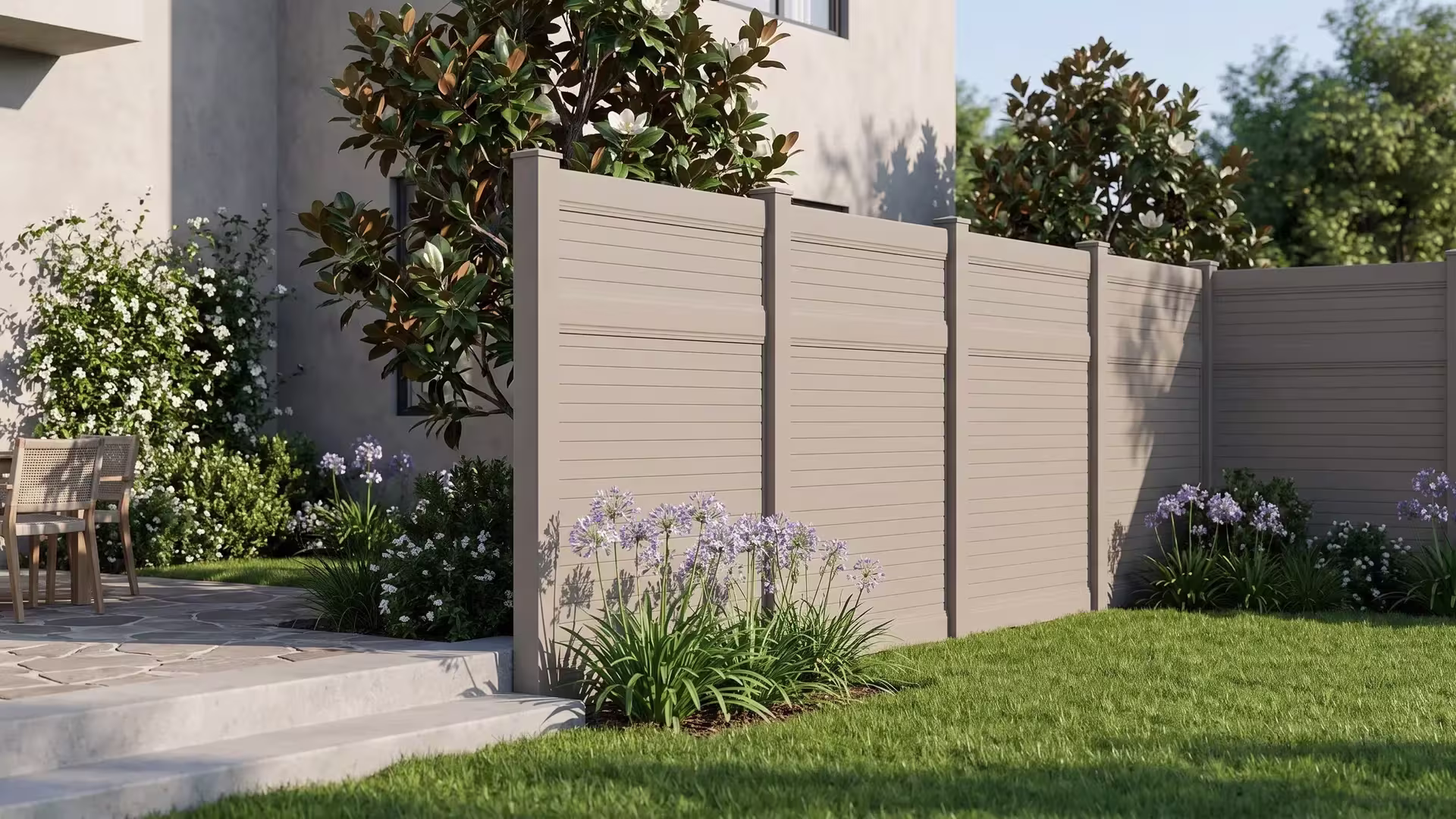 Clay vinyl horizontal privacy fence encloses a terrace for outdoor dining beside poured concrete steps